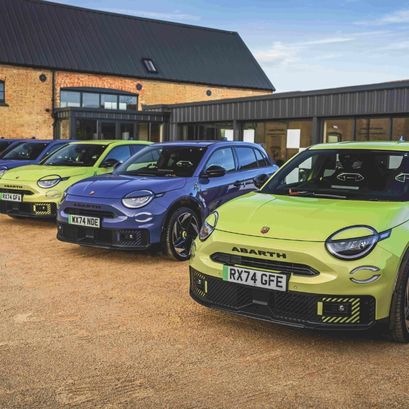 Abarth cars in courtyard